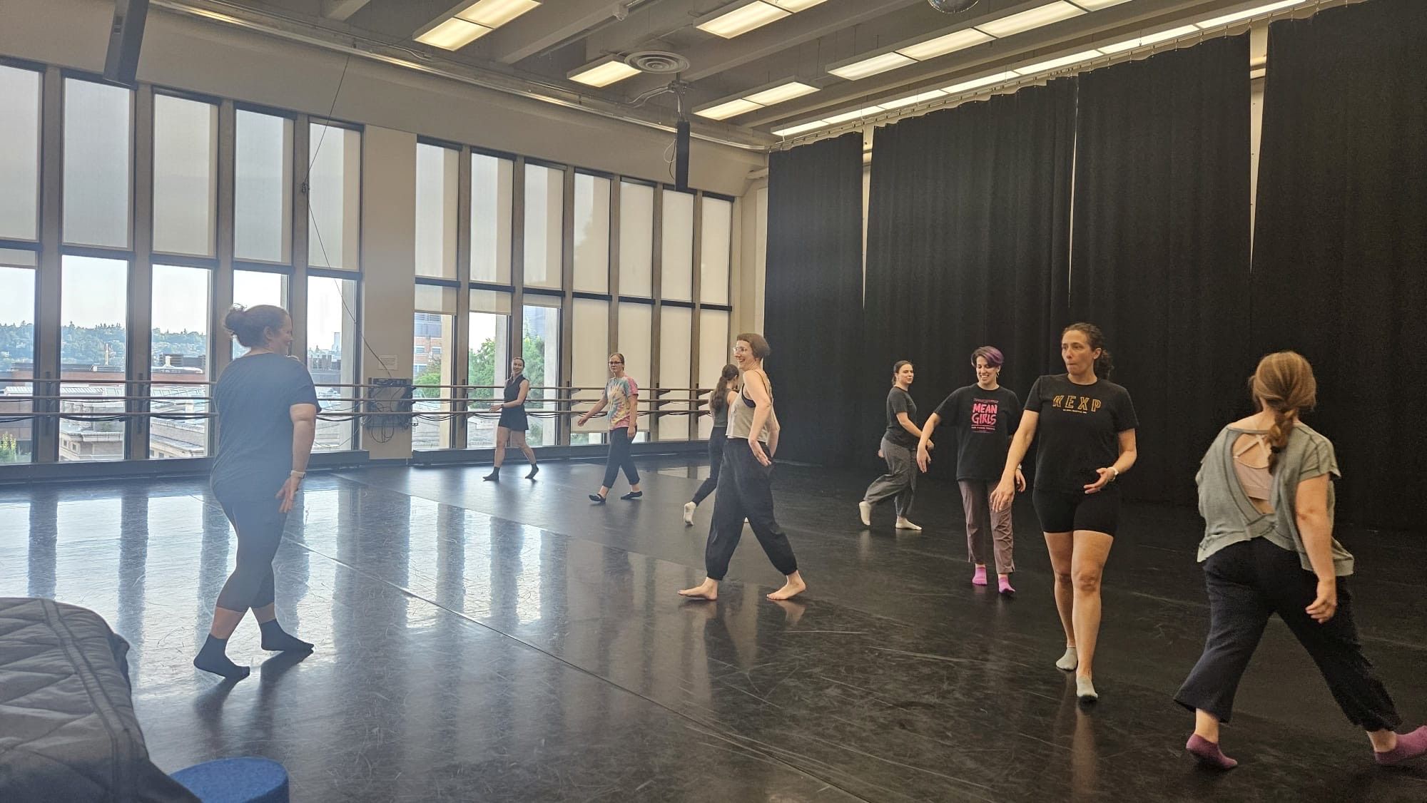 Rain City Tappers in light lit studio at UW